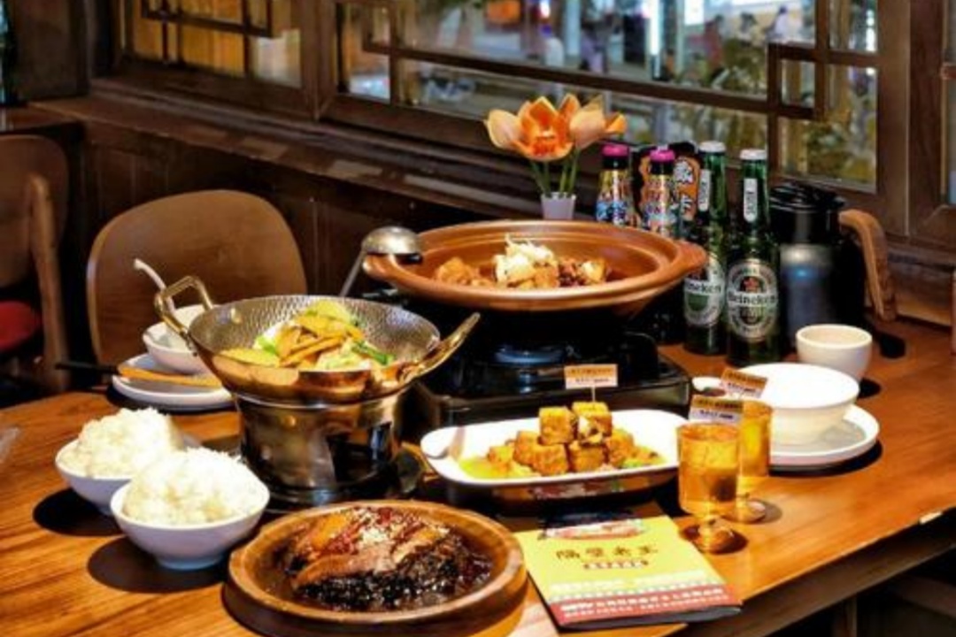 Where can you eat the most typical food in Lijiang?
